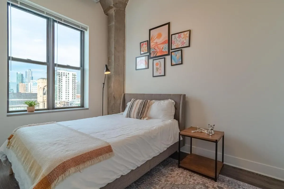 Image 3 of McCormick Place modern loft with an amazing city skyline view and optional parking for 8 guests